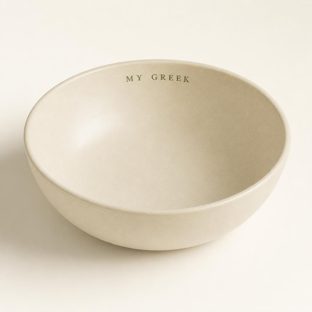 Cream stoneware serving bowl with MY GREEK stamped on the interior rim